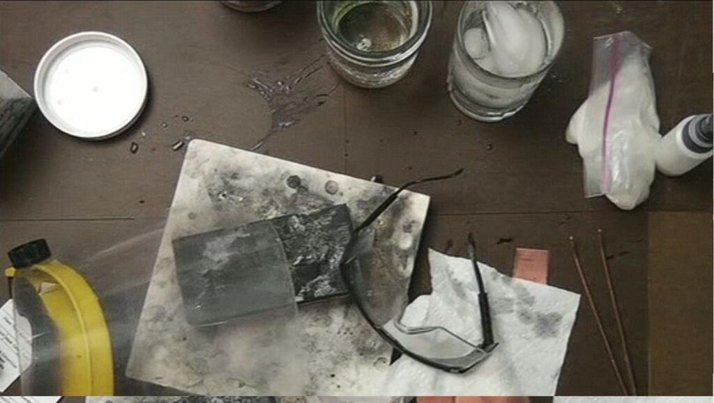 Safety glasses worn during silversmithing at the workbench