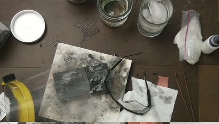 Safety glasses worn during silversmithing at the workbench