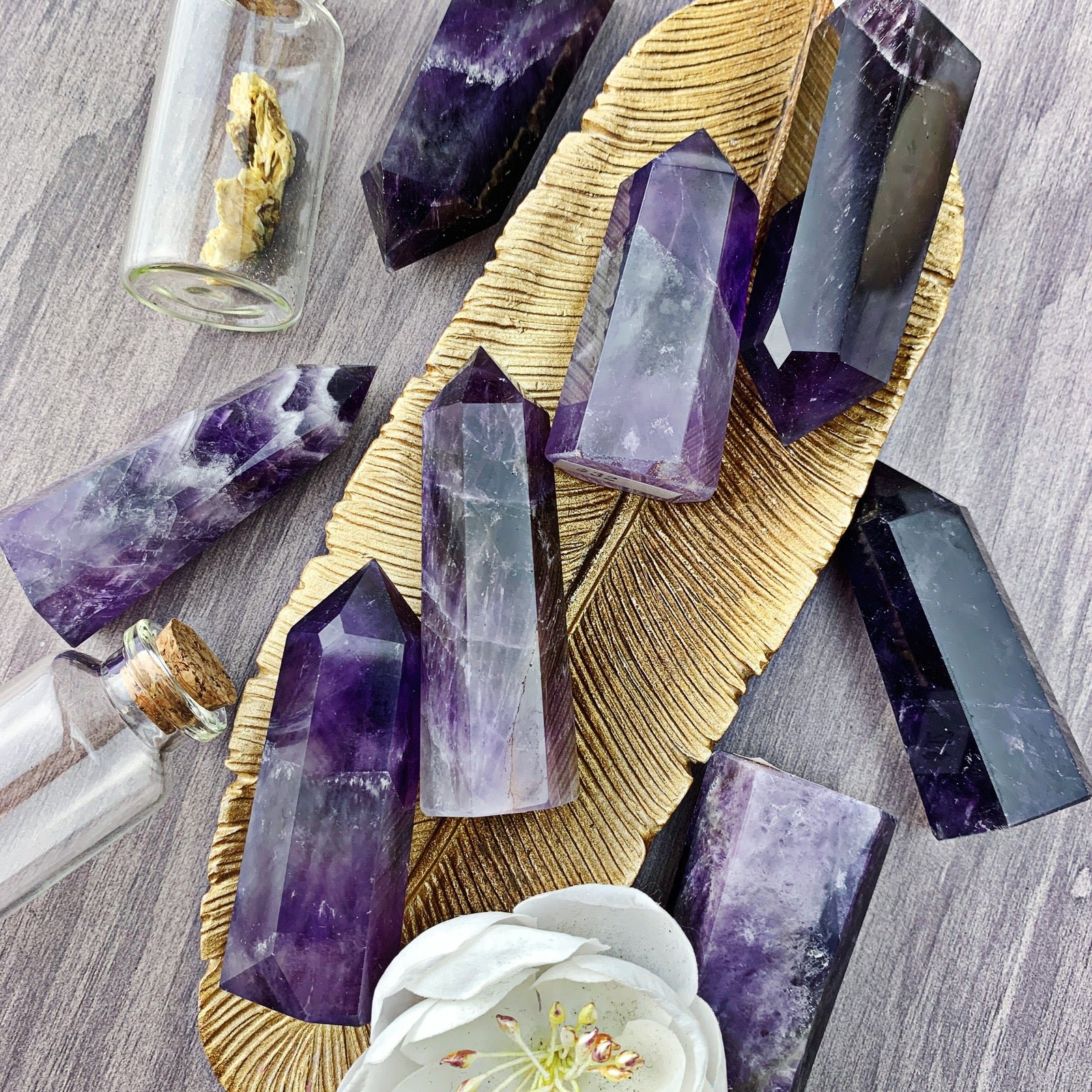 Raw amethyst crystal tower showing deep purple color and natural formation