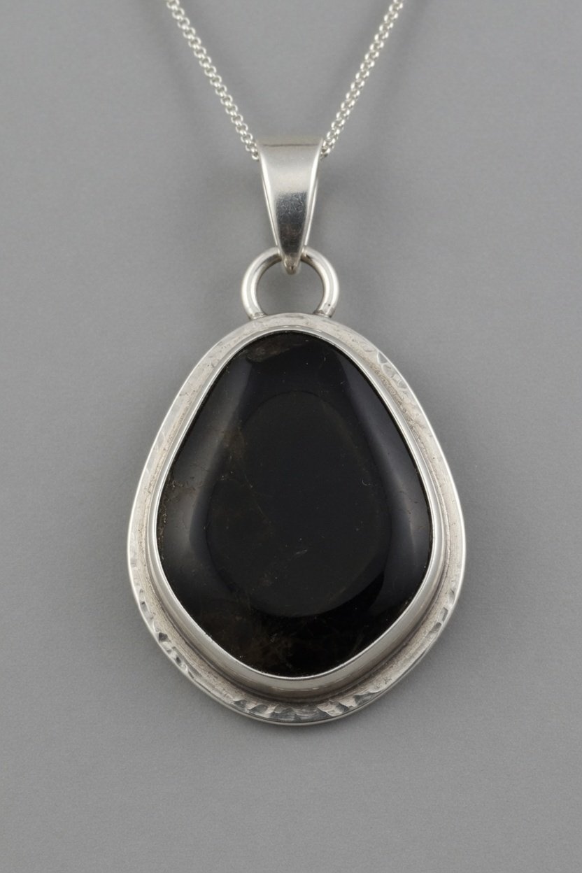 Apache Tears set in sterling silver bezel pendant